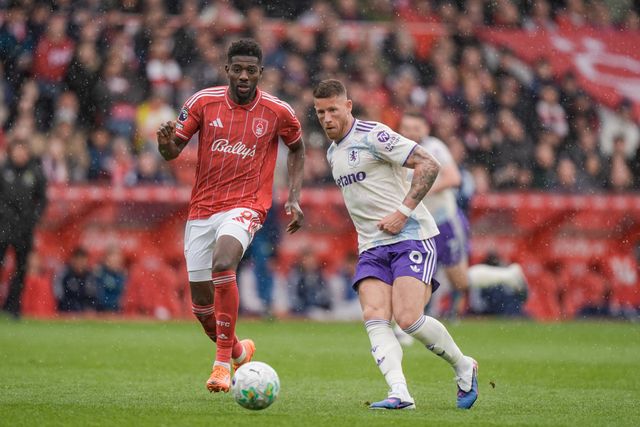 Ross Barkley of Aston Villa passes the ball  under press are from Ibrahim Sangare of Nottingham Forest during the Premier League match Nottingham Forest vs Aston Villa at City Ground, Nottingham, United Kingdom on 12 April 2026

(Photo by Maynard Manyowa/News Images)