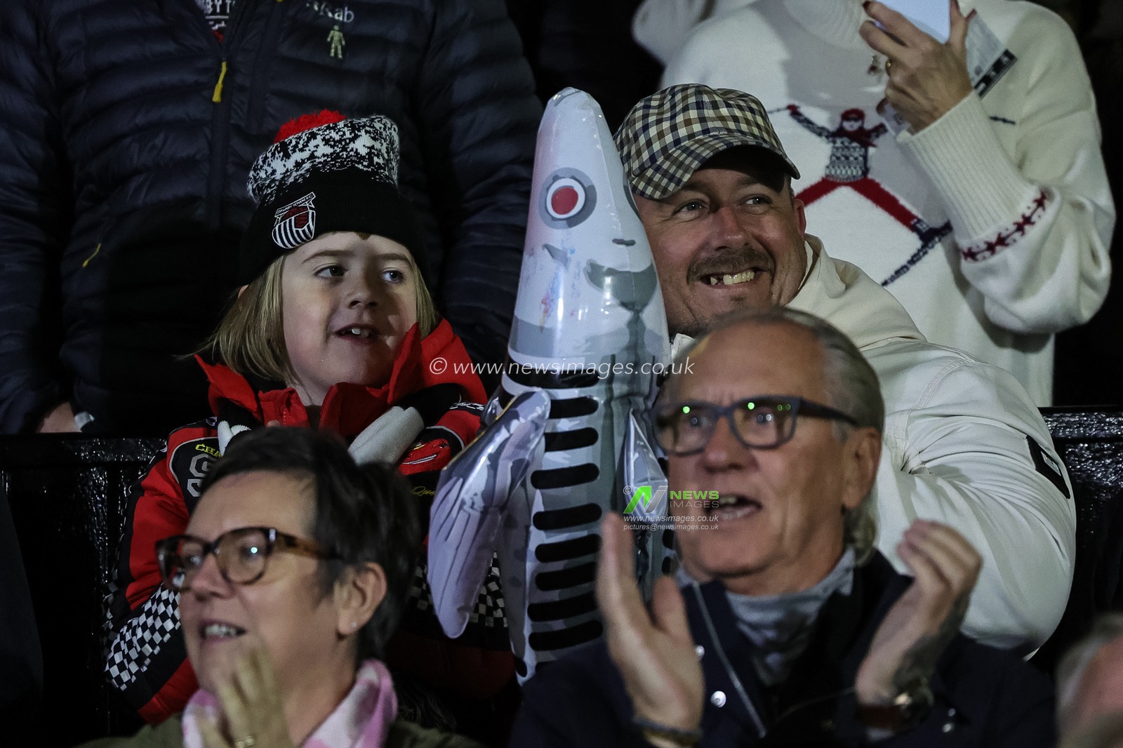 Grimsby fans holding a blow-up cod during the Carabao Cup Last 16 Grimsby Town vs Brentford at Blundell Park, Cleethorpes, United Kingdom, 28th October 2025

(Photo by Mark Cosgrove/News Images)

*** GER AUT SUI OUT ***