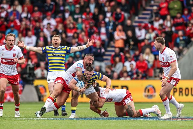 Danny Walker of Warrington Wolves is tackled by Elliot Minchella of Hull KR during the Betfred Challenge Cup Semi-Finals match Warrington Wolves vs Hull KR at Eco-Power Stadium, Doncaster, United Kingdom on 10 May 2026

(Photo by Alfie Cosgrove/News Images)