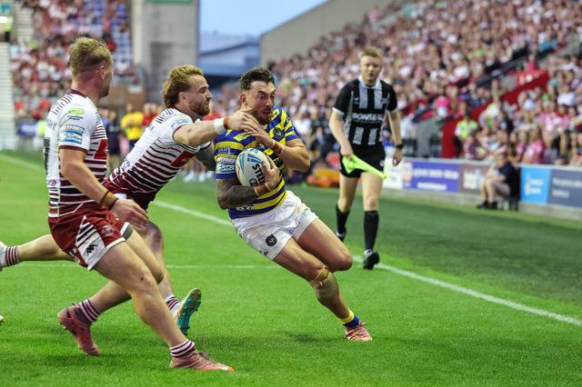 Matty Ashton of Warrington Wolves goes over for a try during the Betfred Super League round 18 match Wigan Warriors vs Warrington Wolves at The Brick Community Stadium, Wigan, United Kingdom on 10 July 2026

(Photo by Mark Cosgrove/News Images)