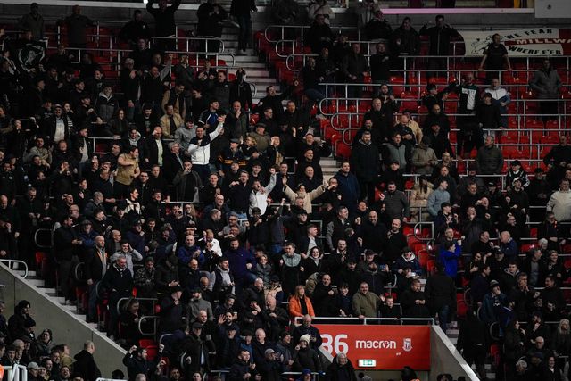 Millwall fans celebrate Femi Azeez of Millwall scoring a goal to make it 0-2 during the Sky Bet Championship match Stoke City vs Millwall at Bet365 Stadium, Stoke On Trent, United Kingdom on 21 April 2026

(Photo by Maynard Manyowa/News Images)