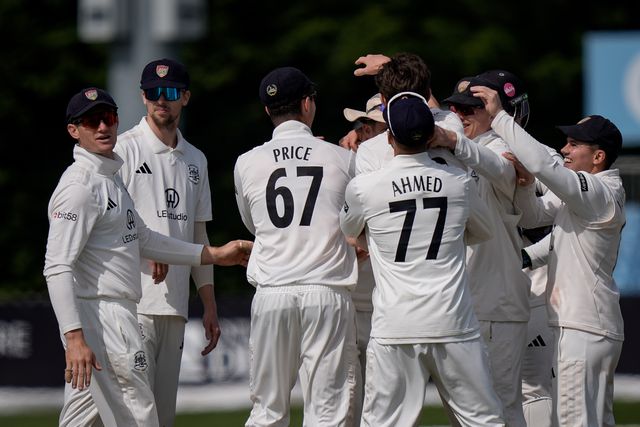 Ed Middleton celebrates taking the wicket of Wayne Madsen off the bowling of Will Williams with his teammates during the County Championship Division Two Derbyshire v Gloucestershire at The Central Co-Op County Ground, Derby, United Kingdom on 26 April 2026

(Photo by Maynard Manyowa/News Images)