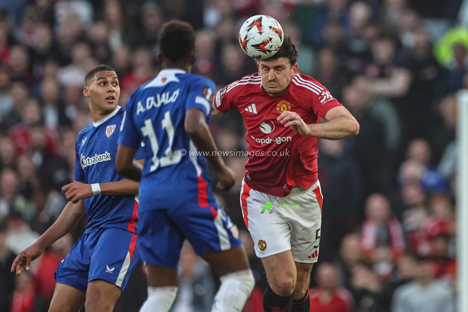 Harry Maguire of Manchester United heads the ball during the UEFA Europa League Semi-final match Manchester United vs Athletic Bilbao at Old Trafford, Manchester, United Kingdom, 8th May 2025

(Photo by Mark Cosgrove/News Images)