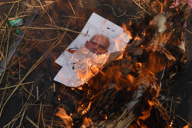 Muslims shout slogans and burn effigies of Indian Prime Minister Narendra Modi and Home Minister Amit Shah in protest against the recently enacted Waqf Act that amends laws governing Muslim land endowments during a protest after the congregational prayers  in Kolkata, India, on April 11, 2025.Photo by Debajyoti Chakraborty.(Photo: Debajyoti Chakraborty/News Images)