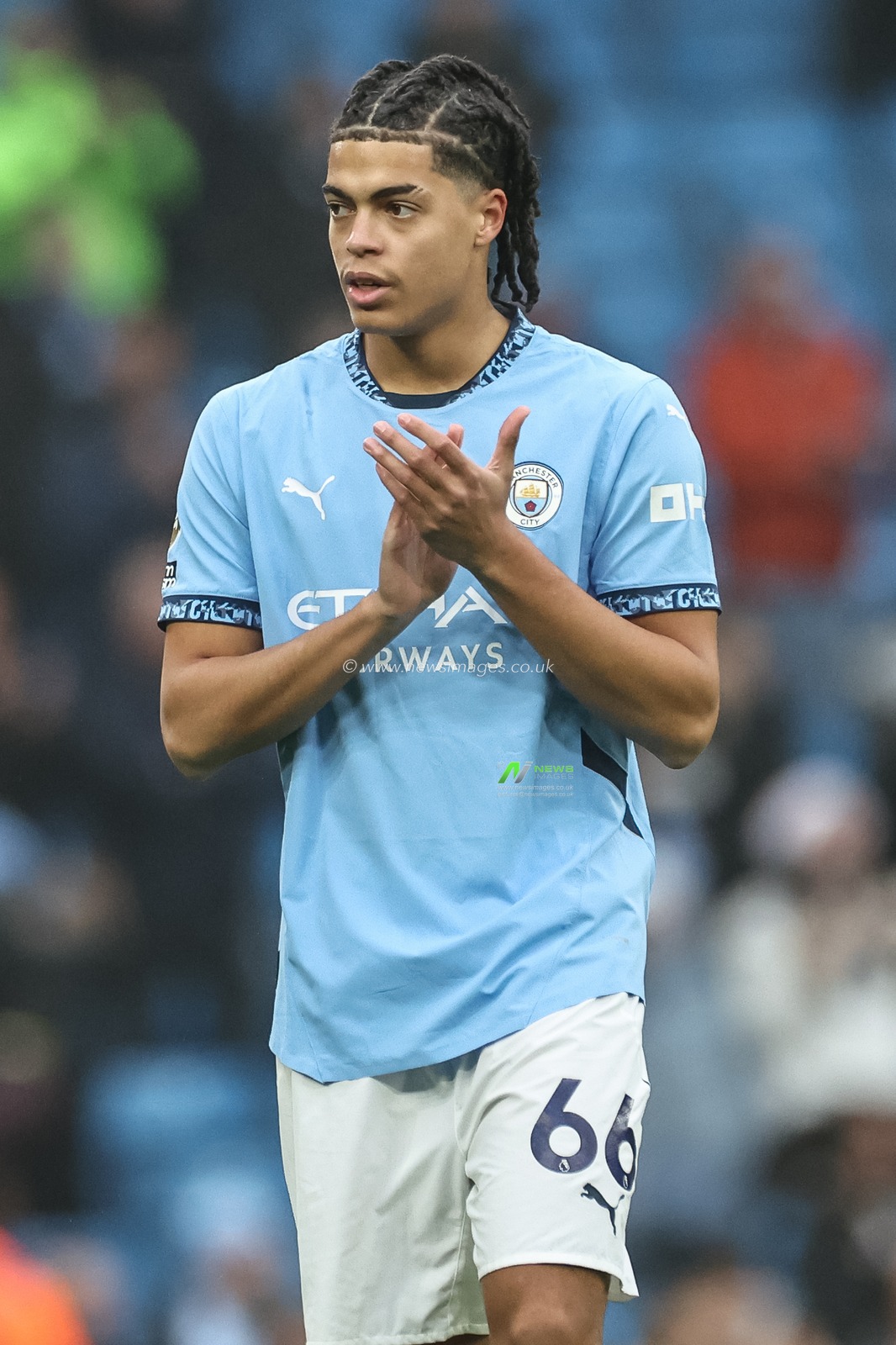 Jahmai Simpson-Pusey of Manchester City applauds the fans after the final whistle during the Premier League match Manchester City vs Everton at Etihad Stadium, Manchester, United Kingdom, 26th December 2024

(Photo by Mark Cosgrove/News Images)
