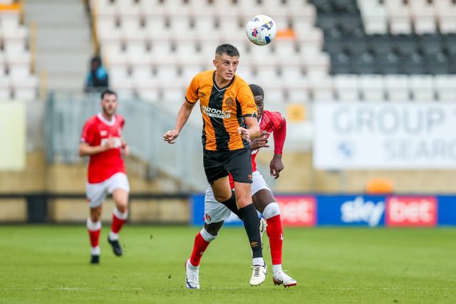 Kell Watts of Cambridge United heads the ball during the Pre-season friendly match Cambridge United vs Charlton Athletic at Abbey Stadium, Cambridge, United Kingdom, 26th July 2025

(Photo by Izzy Poles/News Images)