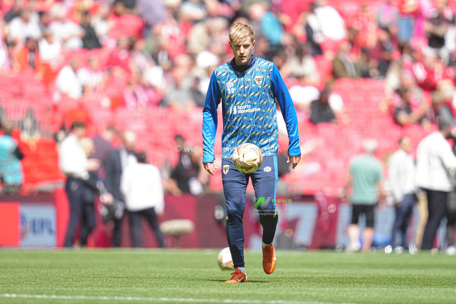 Joe Pigott of AFC Wimbledon warming up ahead of the Sky Bet League 2 Playoff Final match AFC Wimbledon vs Walsall at Wembley Stadium, London, United Kingdom, 26th May 2025

(Photo by Harvey Murphy/News Images)