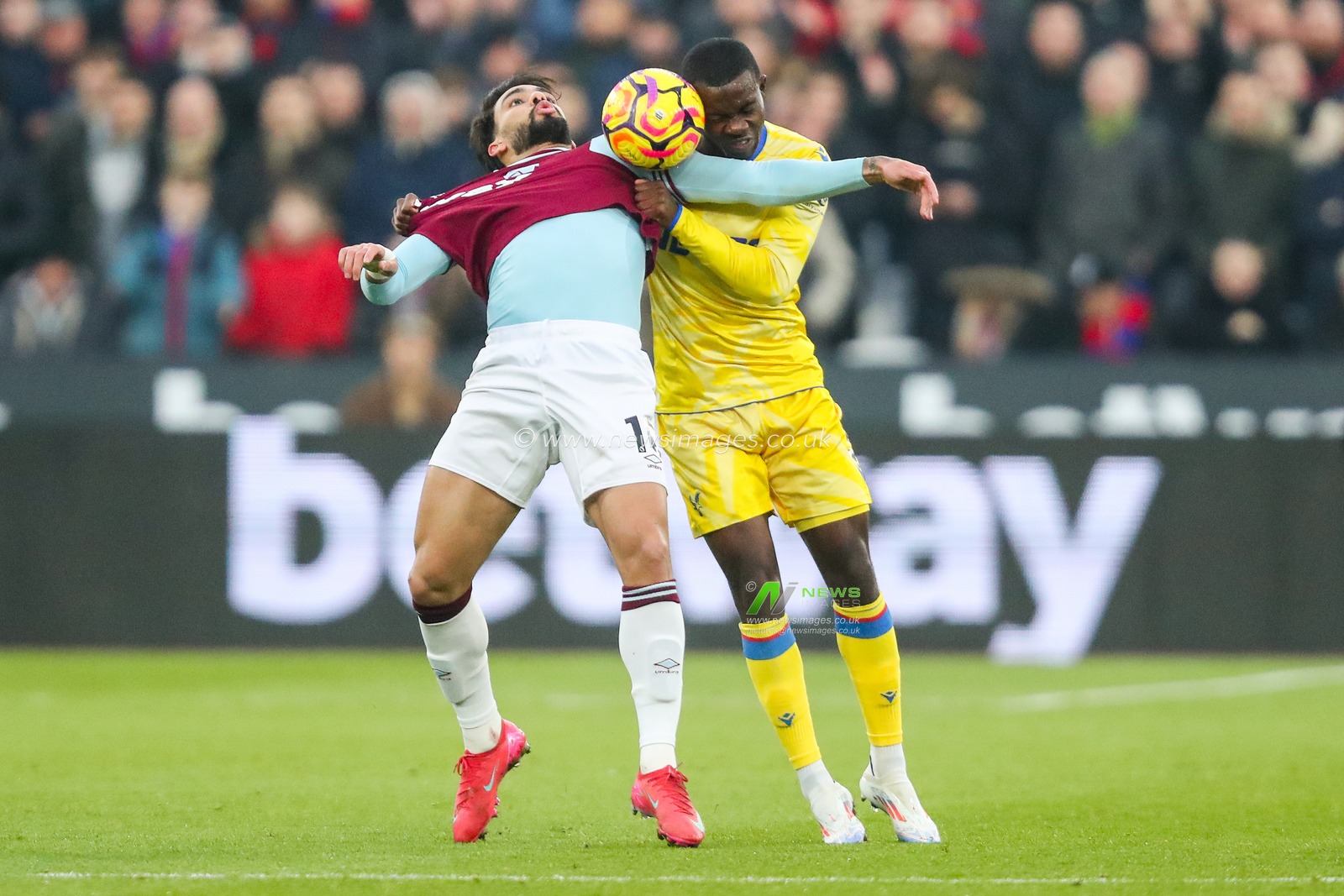 Lucas Paqueta of West Ham United battles for the ball with Tyrick Mitchell of Crystal Palace during the Premier League match West Ham United vs Crystal Palace at London Stadium, London, United Kingdom, 18th January 2025

(Photo by Izzy Poles/News Images)