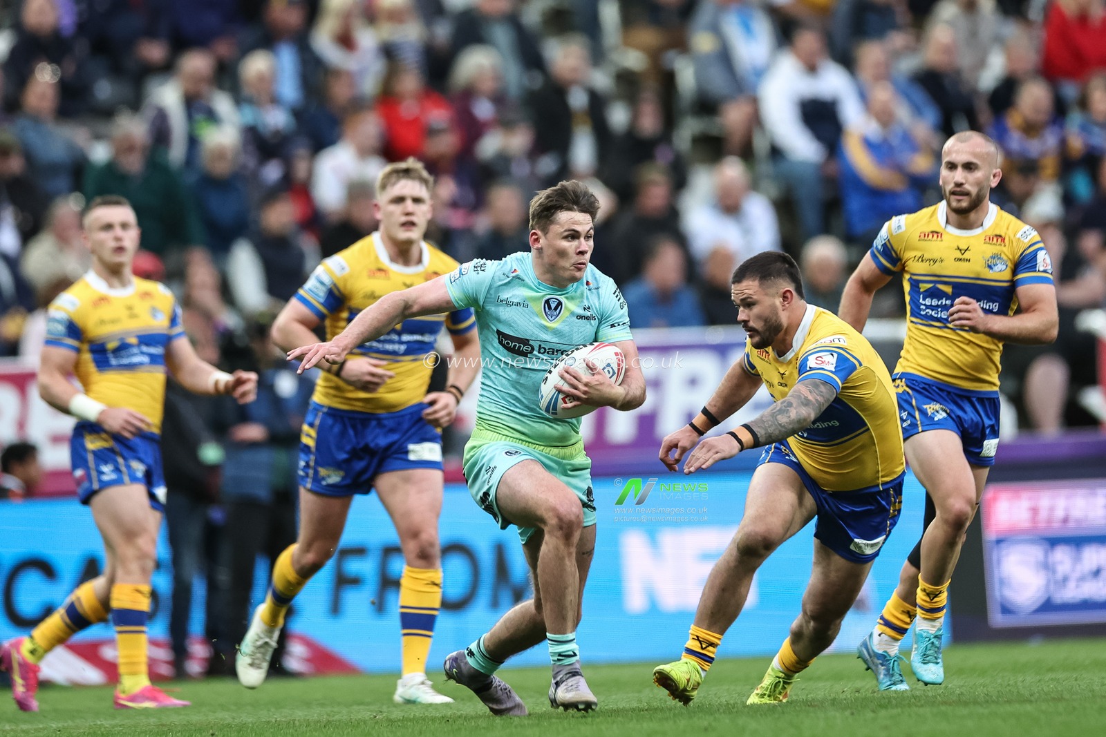 Jack Welsby of St. Helens breaks with the ball during the Betfred Magic Weekend 2025 match St Helens vs Leeds Rhinos at St. James's Park, Newcastle, United Kingdom, 3rd May 2025

(Photo by Mark Cosgrove/News Images)