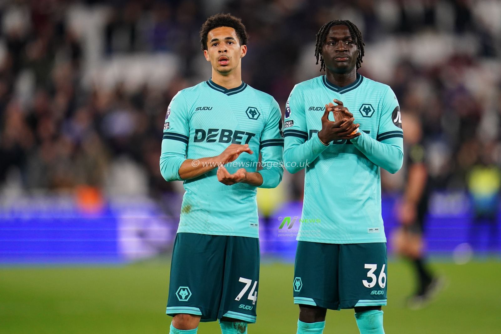 Tom Edozie of Wolverhampton Wanderers and Mateus Mane of Wolverhampton Wanderers at full time during the Premier League match West Ham United vs Wolverhampton Wanderers at London Stadium, London, United Kingdom on 10 April 2026

(Photo by Harvey Murphy/News Images)