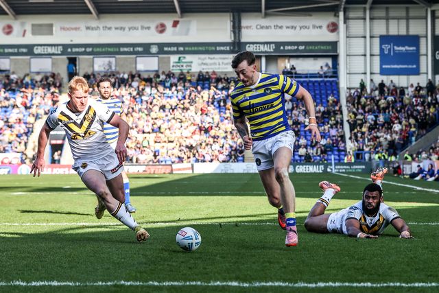 Matty Ashton of Warrington Wolves goes over for a try during the Betfred Super League round 5 match Warrington Wolves vs Castleford Tigers at The Halliwell Jones Stadium, Warrington, United Kingdom on 21 March 2026

(Photo by Alfie Cosgrove/News Images)