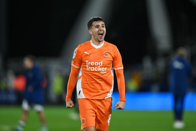 Albie Morgan of Blackpool celebrates with the fans at the end of the Sky Bet League 1 match Huddersfield Town vs Blackpool at John Smith's Stadium, Huddersfield, United Kingdom, 24th September 2024

(Photo by Craig Thomas/News Images)