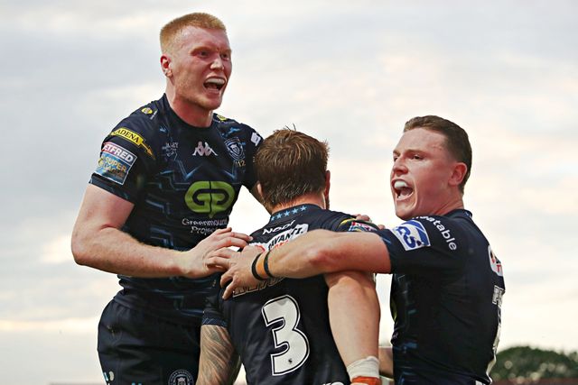 Adam Keighran of Wigan Warriors celebrates his try with Zach Eckersley of Wigan Warriors and Jai Field of Wigan Warriors during the Betfred Super League round 15 match Wakefield Trinity vs Wigan Warriors at DIY Kitchens Stadium, Wakefield, United Kingdom, 20th June 2025

(Photo by Sam Eaden/News Images)