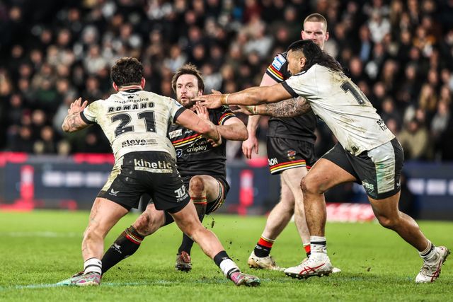 Joe Mellor of Bradford Bulls is tackled by Arthur Romano of Hull FC and Ligi Sao of Hull FC during the Betfred Super League round 1 match Hull FC vs Bradford Bulls at MKM Stadium, Hull, United Kingdom on 14 February 2026

(Photo by Alfie Cosgrove/News Images)