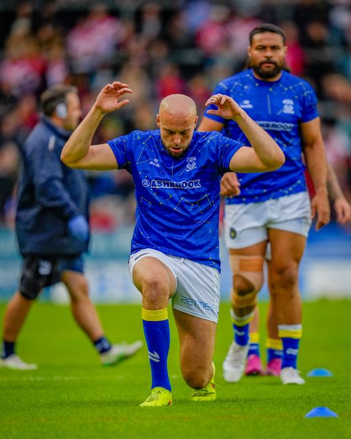 Warrington warriors players in the pre-game warm up session during the Betfred Super League round 14 match St Helens vs Warrington Wolves at The BrewDog Stadium, St Helens, United Kingdom on 11 June 2026

(Photo by Maynard Manyowa/News Images)