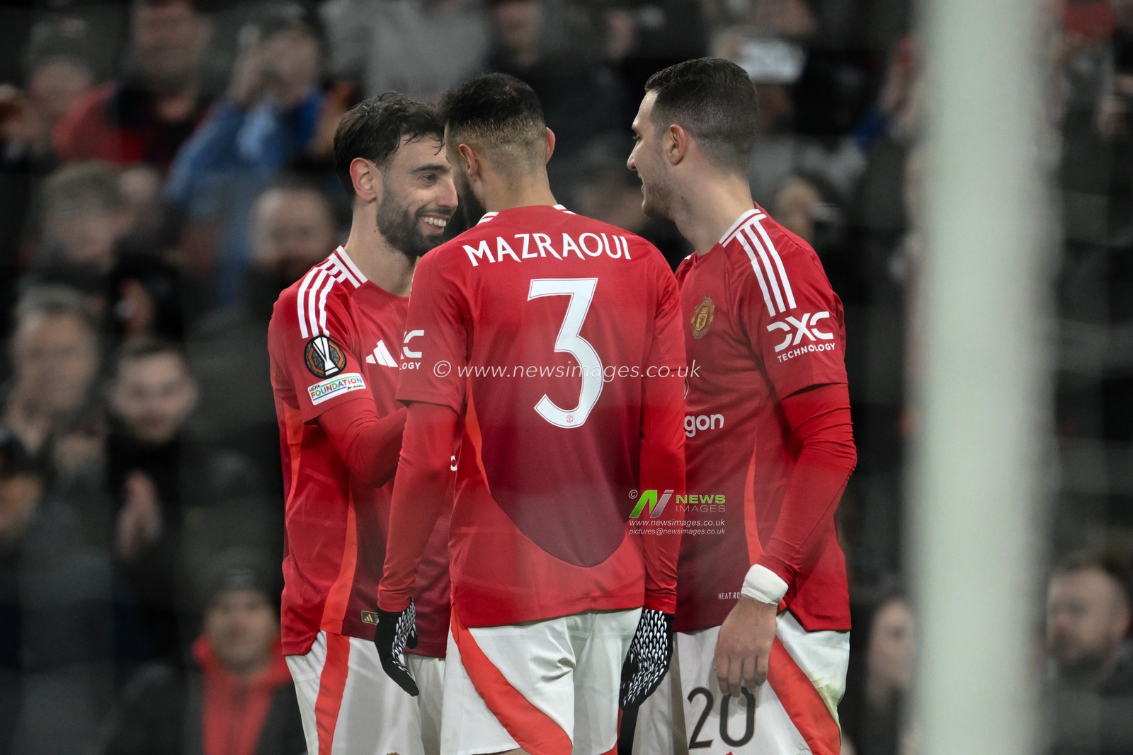 Diogo Dalot of Manchester United celebrates his goal to make it 4-1 during the UEFA Europa League Last 16 match Manchester United vs Real Sociedad at Old Trafford, Manchester, United Kingdom, 13th March 2025

(Photo by Craig Thomas/News Images)