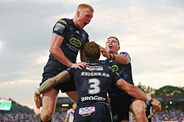 Adam Keighran of Wigan Warriors celebrates his try with Zach Eckersley of Wigan Warriors and Jai Field of Wigan Warriors during the Betfred Super League round 15 match Wakefield Trinity vs Wigan Warriors at DIY Kitchens Stadium, Wakefield, United Kingdom, 20th June 2025

(Photo by Sam Eaden/News Images)