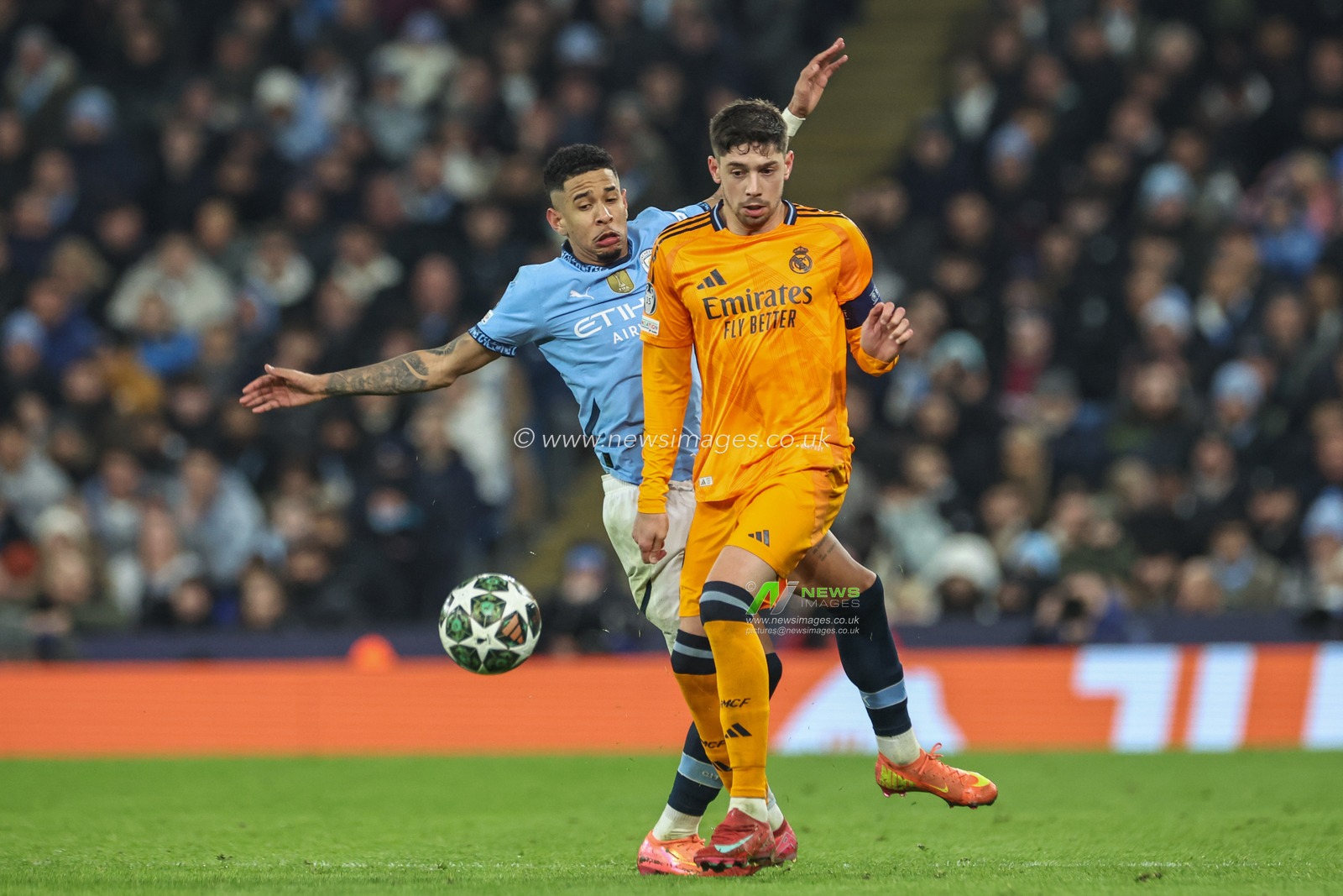 Federico Valverde of Real Madrid and Savinho of Manchester City battle for the ball during the UEFA Champions League Knockout Round Play-off Manchester City v Real Madrid at Etihad Stadium, Manchester, United Kingdom, 11th February 2025

(Photo by Mark Cosgrove/News Images)