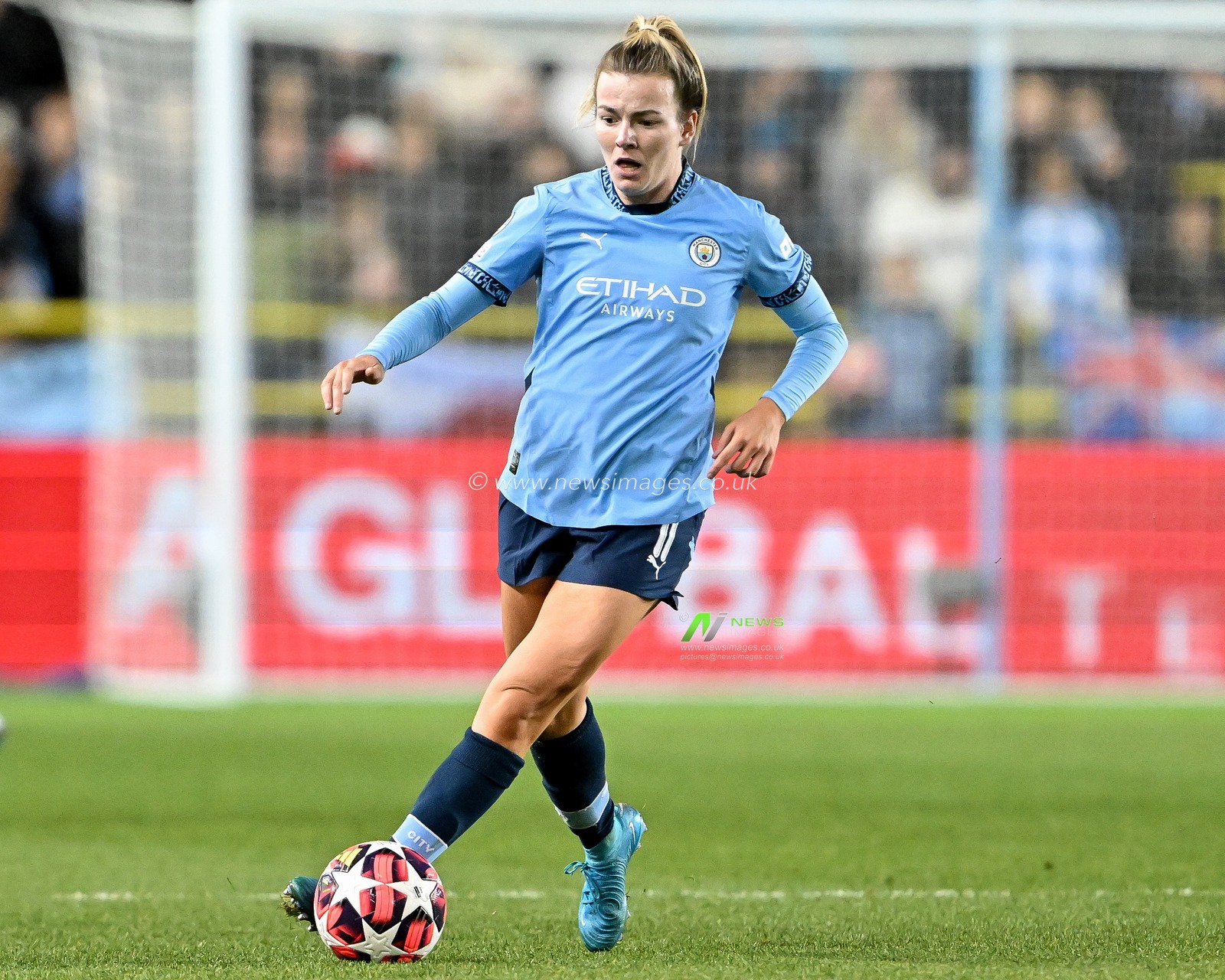 Lauren Hemp of Manchester City Women runs with the ball during the UEFA Women's Champions League match  - Group D - Manchester City vs Barcelona at Manchester City Academy Stadium, Manchester, United Kingdom, 9th October 2024

(Photo by Cody Froggatt/News Images)