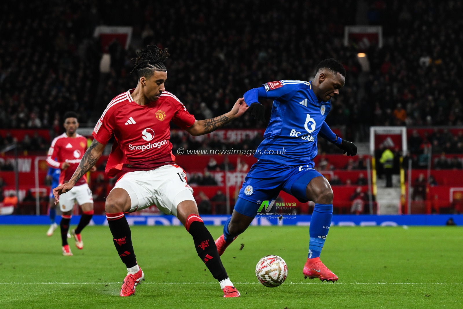 Leny Yoro of Manchester United and Patson Daka of Leicester City battle for the ball during the Emirates FA Cup Fourth Round match Manchester United vs Leicester City at Old Trafford, Manchester, United Kingdom, 7th February 2025

(Photo by Craig Thomas/News Images)