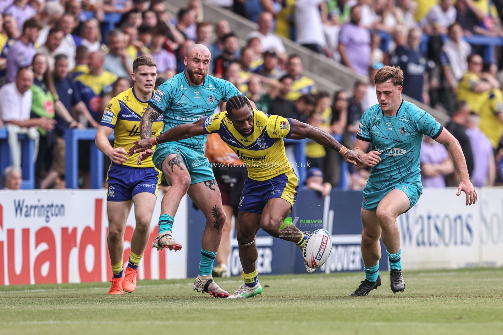 Rodrick Tai of Warrington Wolves recovers the ball during the Betfred Super League round 15 match Warrington Wolves vs Huddersfield Giants at Halliwell Jones Stadium, Warrington, United Kingdom, 21st June 2025

(Photo by Alfie Cosgrove/News Images)