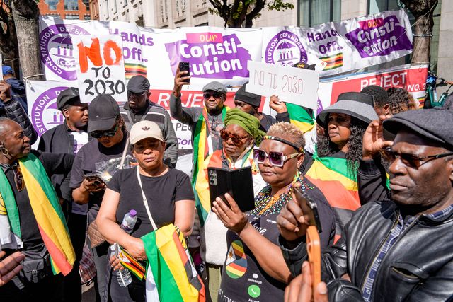 UK-based Zimbabweans gather outside the Zimbabwe Embassy in London on 18 April 2026 to protest the Constitution of Zimbabwe Amendment (No. 3) Bill, which critics say would extend President Mnangagwa’s rule until 2030 and strip citizens of the direct vote for president.

(Photo by Maynard Manyowa/News Images)