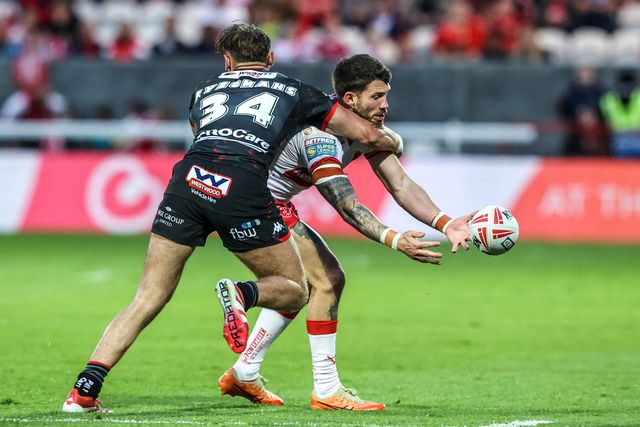 Oliver Gildart of Hull KR is tackled by Finlay Yeomans of Wigan Warriors during the Betfred Super League round 12 match Hull KR vs Wigan Warriors at Sewell Group Craven Park, Hull, United Kingdom on 21 May 2026

(Photo by Alfie Cosgrove/News Images)