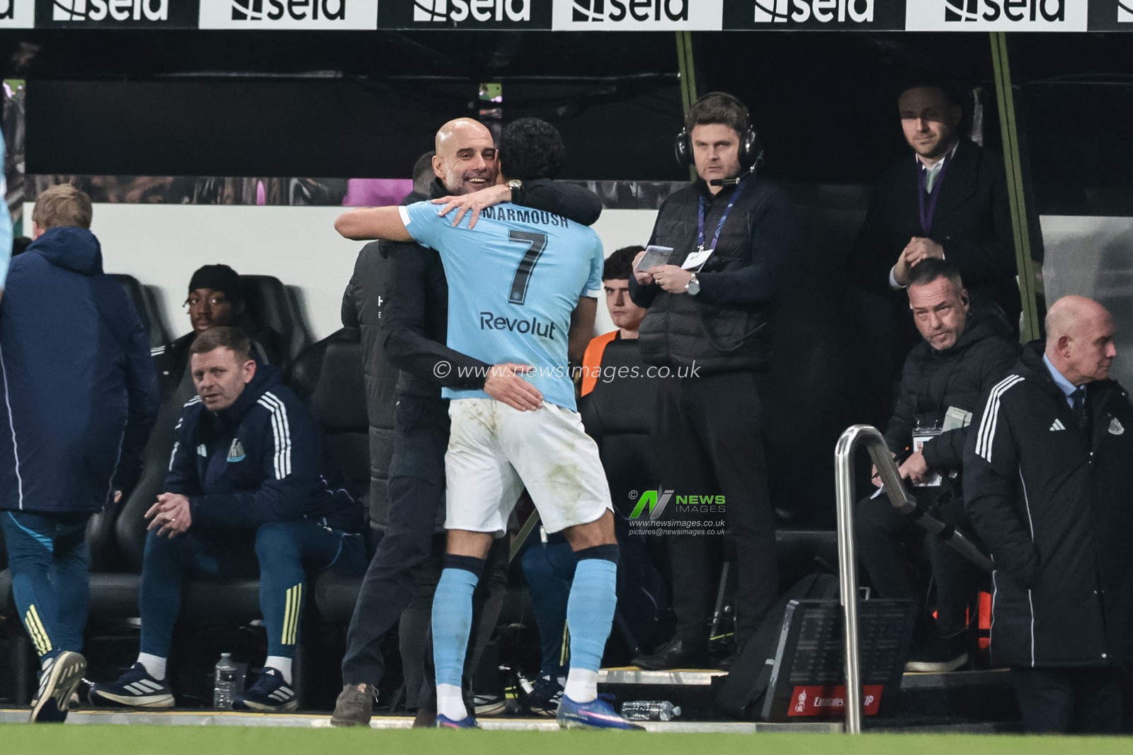 Pep Guardiola manager of Manchester City embraces Omar Marmoush of Manchester City after he’s substituted during the Emirates FA Cup 5th Round  match Newcastle Untied vs Manchester City at St. James's Park, Newcastle, United Kingdom on 07 March 2026

(Photo by Mark Cosgrove/News Images)