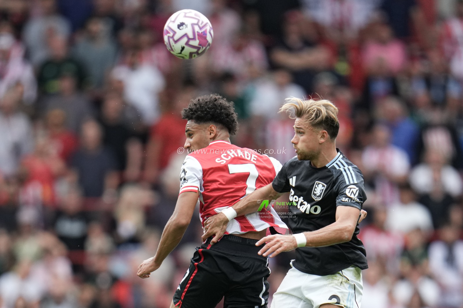 Matty Cash of Aston Villa and Kevin Schade of Brentford during during the Premier League match Brentford vs Aston Villa at The Gtech Community Stadium, London, United Kingdom, 23rd August 2025

(Photo by Harvey Murphy/News Images)