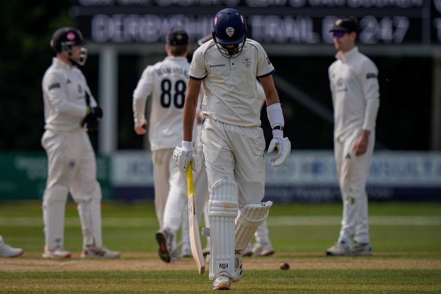 Shoaib Bashir walks off after being given out LBW off the bowling of Graeme van Buuren as Gloucestershire players celebrate a wicket during the County Championship Division Two Derbyshire v Gloucestershire at The Central Co-Op County Ground, Derby, United Kingdom on 26 April 2026

(Photo by Maynard Manyowa/News Images)
