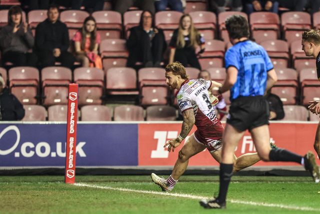 Adam Keighran of Wigan Warriors goes over for a try during the Betfred Super League round 5 match Wigan Warriors vs York Knights at The Brick Community Stadium, Wigan, United Kingdom on 19 March 2026

(Photo by Alfie Cosgrove/News Images)