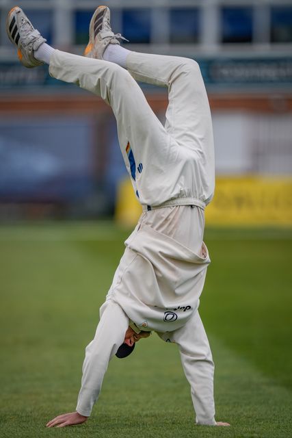 Zak Chappell does a hand stand during the County Championship Division Two Derbyshire vs Northamptonshire day four match at The Central Co-Op County Ground, Derby, United Kingdom on 11 May 2026

(Photo by Maynard Manyowa/News Images)