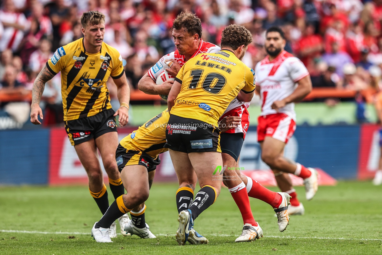 Jai Whitbread of Hull KR is tackled during the Betfred Super League round 21 match Hull KR vs Castleford Tigers at Sewell Group Craven Park, Kingston upon Hull, United Kingdom, 9th August 2025

(Photo by Alfie Cosgrove/News Images)