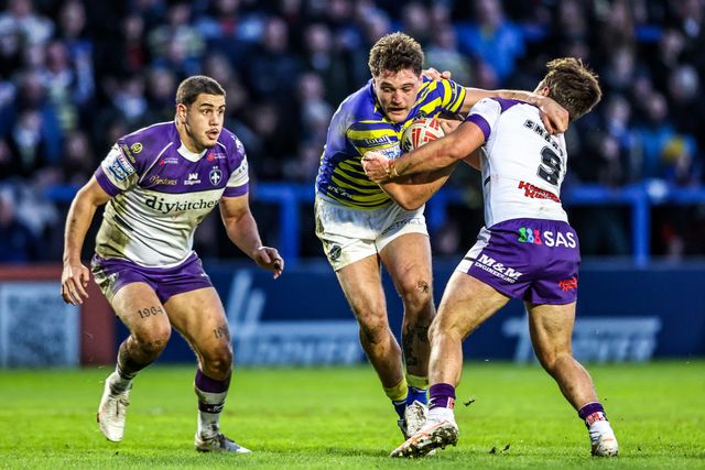 Liam Byrne of Warrington Wolves is tackled by Tyson Smoothy of Wakefield Trinity during the Betfred Super League Round 3 match Warrington Wolves vs Wakefield Trinity at The Halliwell Jones Stadium, Warrington, United Kingdom on 28 February 2026

(Photo by Alfie Cosgrove/News Images)