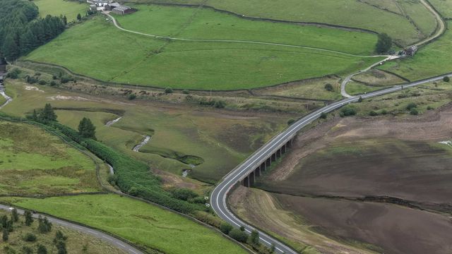Woodhead Reservoir walter levels drop to one of the lowest points in recent times as grass and other plants start to grow on the Reservoir silt bed at Woodhead, Glossop, United Kingdom, 31st July 2025

(Photo by Mark Cosgrove/News Images)
