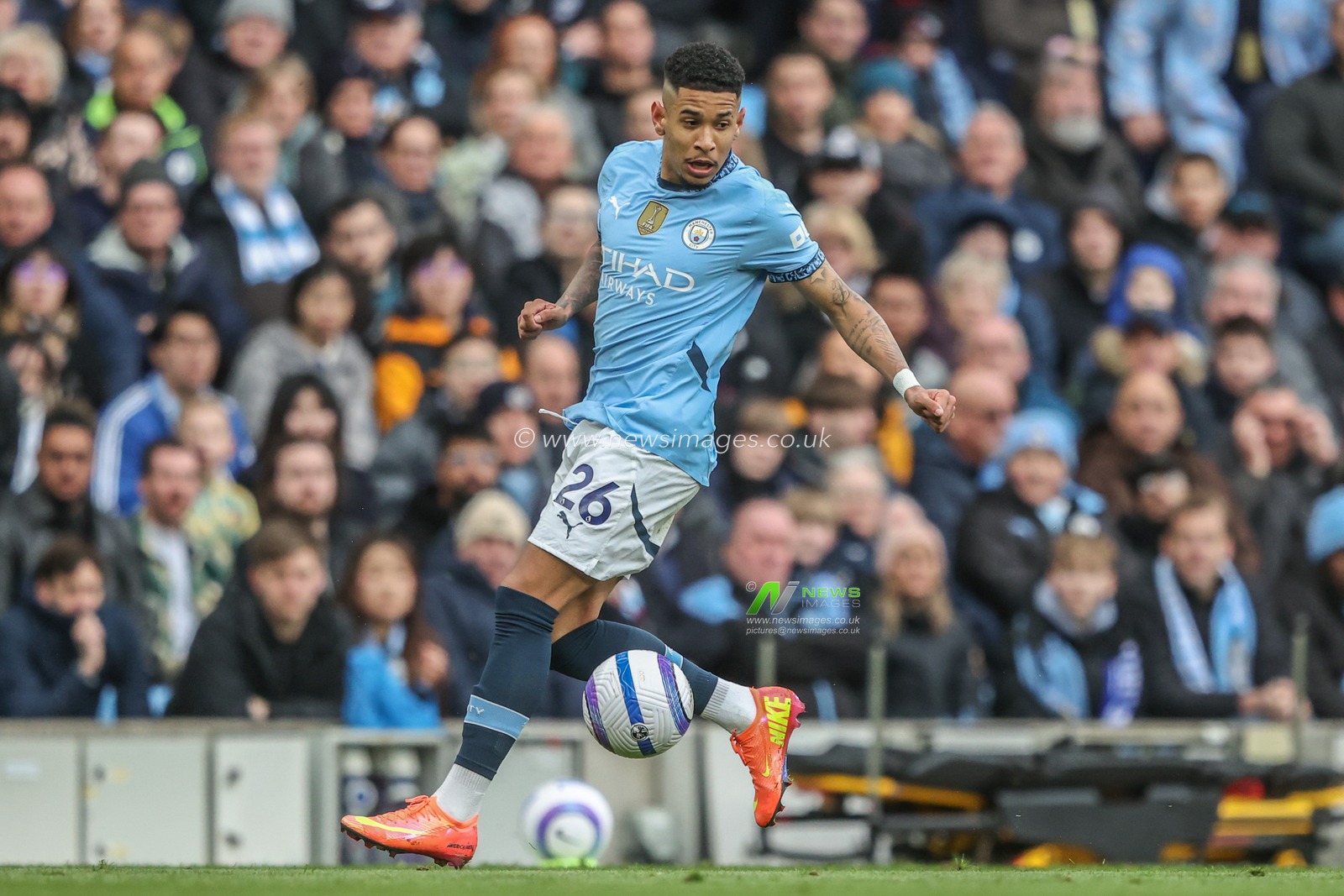 Savinho of Manchester City breaks with the ball during the Premier League match Manchester City vs Brighton and Hove Albion at Etihad Stadium, Manchester, United Kingdom, 15th March 2025

(Photo by Alfie Cosgrove/News Images)
