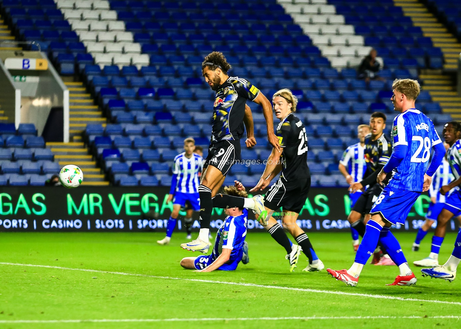 Dominic Calvert-Lewin of Leeds United has a shot on goal during the Carabao Cup match Sheffield Wednesday vs Leeds United at Hillsborough, Sheffield, United Kingdom, 26th August 2025

(Photo by Richard Bierton/News Images)