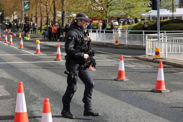 Armed police outside the main entrance during the 2026 Randox Grand National Day at Aintree Racecourse, Aintree, United Kingdom on 11 April 2026

(Photo by Mark Cosgrove/News Images)