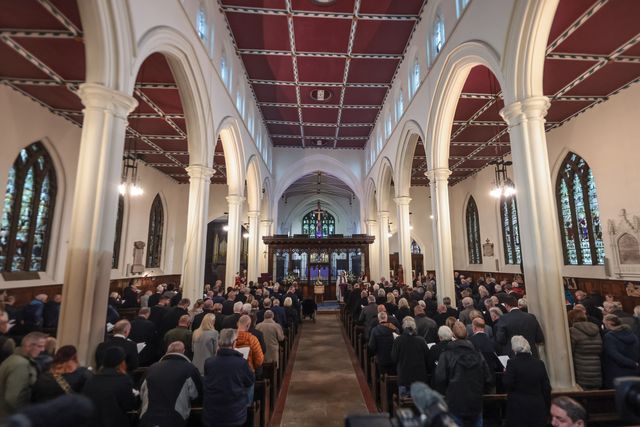 Attendee’s stand while they sing hymns during the Funeral of Harold Dennis “Dickie” Bird OBE at St Mary's Church, Barnsley, United Kingdom, 19th October 2025

(Photo by Mark Cosgrove/News Images)