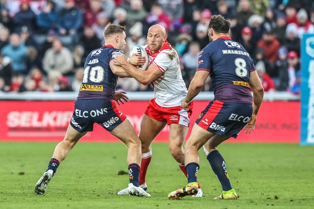 Dean Hadley of Hull KR is tackled by Matty Lees of St. Helens during the Betfred Super League Semi Final 2 match Hull KR vs St Helens at Sewell Group Craven Park, Kingston upon Hull, United Kingdom, 3rd October 2025

(Photo by Alfie Cosgrove/News Images)