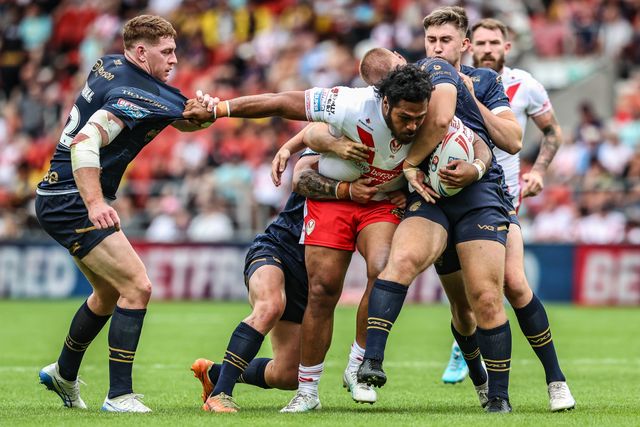 Agnatius Paasi of St. Helens is tackled during the Betfred Super League round 16 match St Helens vs Salford Red Devils at Totally Wicked Stadium, St Helens, United Kingdom, 29th June 2025

(Photo by Alfie Cosgrove/News Images)
