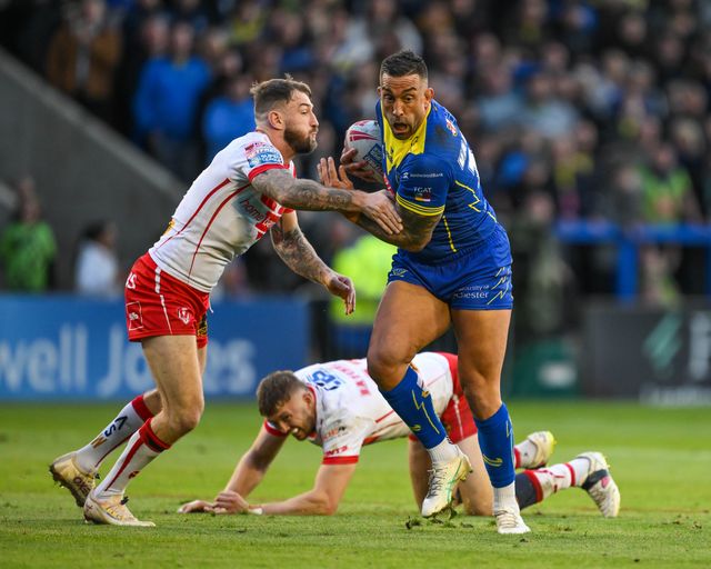 Paul Vaughan of Warrington Wolves evades the tackle of Daryl Clark of St. Helens during the Betfred Super League play-off Eliminator 2 Warrington Wolves v St Helens at Halliwell Jones Stadium, Warrington, United Kingdom, 28th September 2024

(Photo by Craig Thomas/News Images)