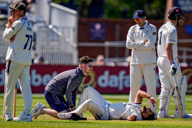 Anuj Dal of Derbyshire receives treatment before leaving the field of play injured during the County Championship Division Two Derbyshire vs Gloucestershire at The Central Co-Op County Ground, Derby, United Kingdom on 24 April 2026

(Photo by Maynard Manyowa/News Images)