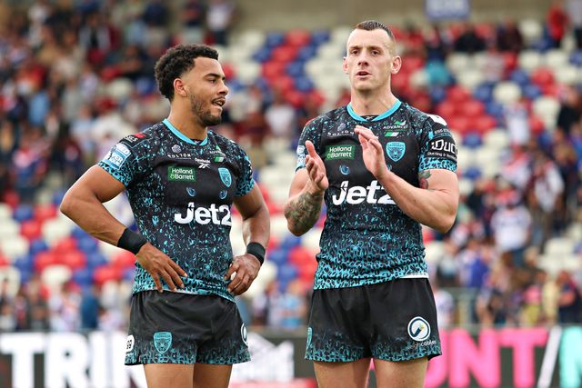 Darnell McIntosh of Leigh Leopards and Frankie Halton of Leigh Leopards applaud the fans after the Betfred Super League Round 14 match Wakefield Trinity vs Leigh Leopards at DIY Kitchens Stadium, Wakefield, United Kingdom, 15th June 2025

(Photo by Sam Eaden/News Images)