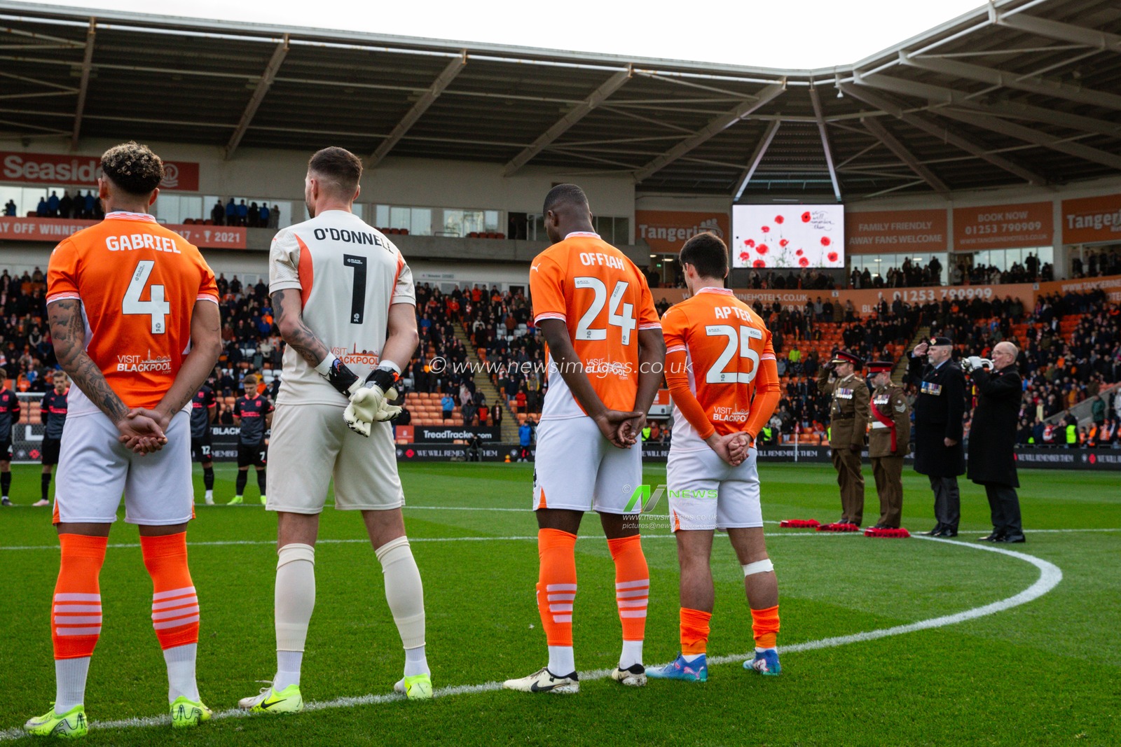 Blackpool players honour a minutes silence for the fallen soldiers ahead of the Sky Bet League 1 match Blackpool vs Northampton Town at Bloomfield Road, Blackpool, United Kingdom, 16th November 2024

(Photo by Gareth Evans/News Images)