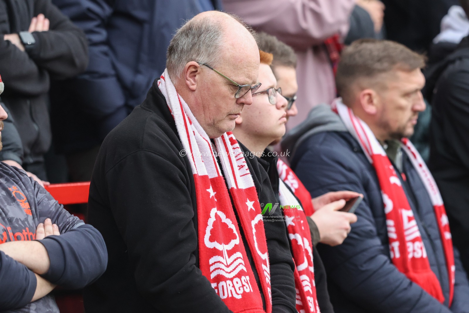 A Nottingham Forest fan during a minute silence for Remembrance Day during the Premier League match Nottingham Forest vs Newcastle United at City Ground, Nottingham, United Kingdom, 10th November 2024

(Photo by Alfie Cosgrove/News Images)
