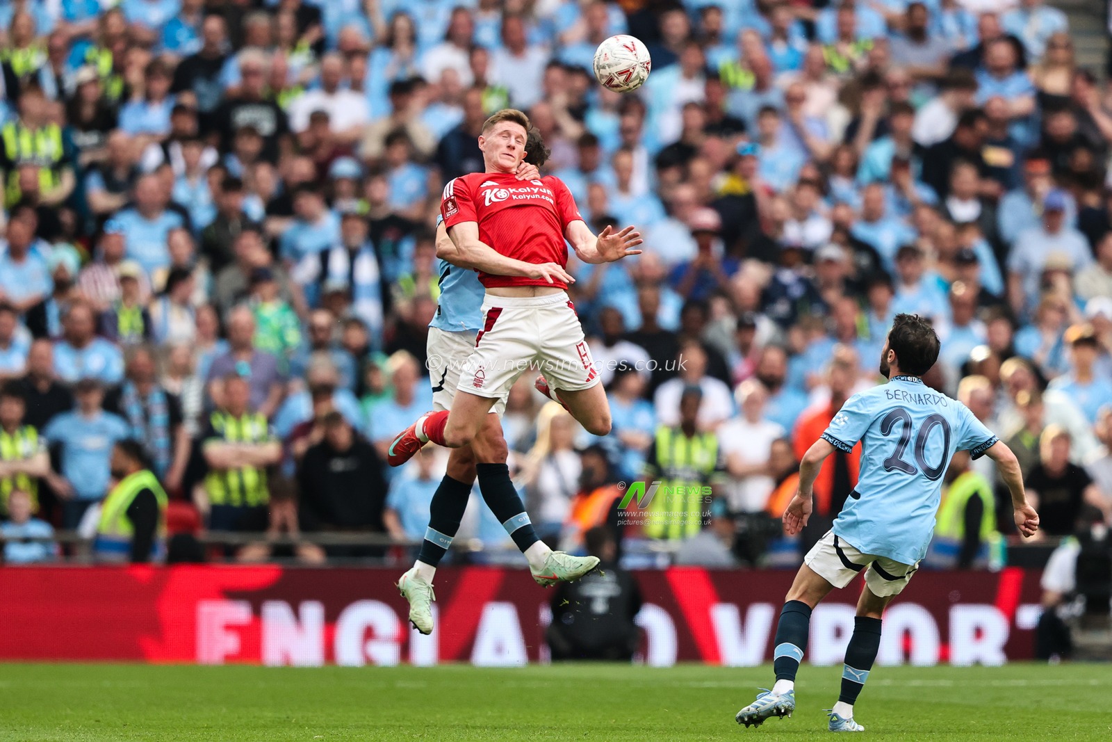 RÃºben Dias of Manchester City and Elliot Anderson of Nottingham Forest battle for the high ball during the Emirates FA Cup Semi-Final match Nottingham Forest vs Manchester City at Wembley Stadium, London, United Kingdom, 26th April 2025

(Photo by Alfie Cosgrove/News Images)