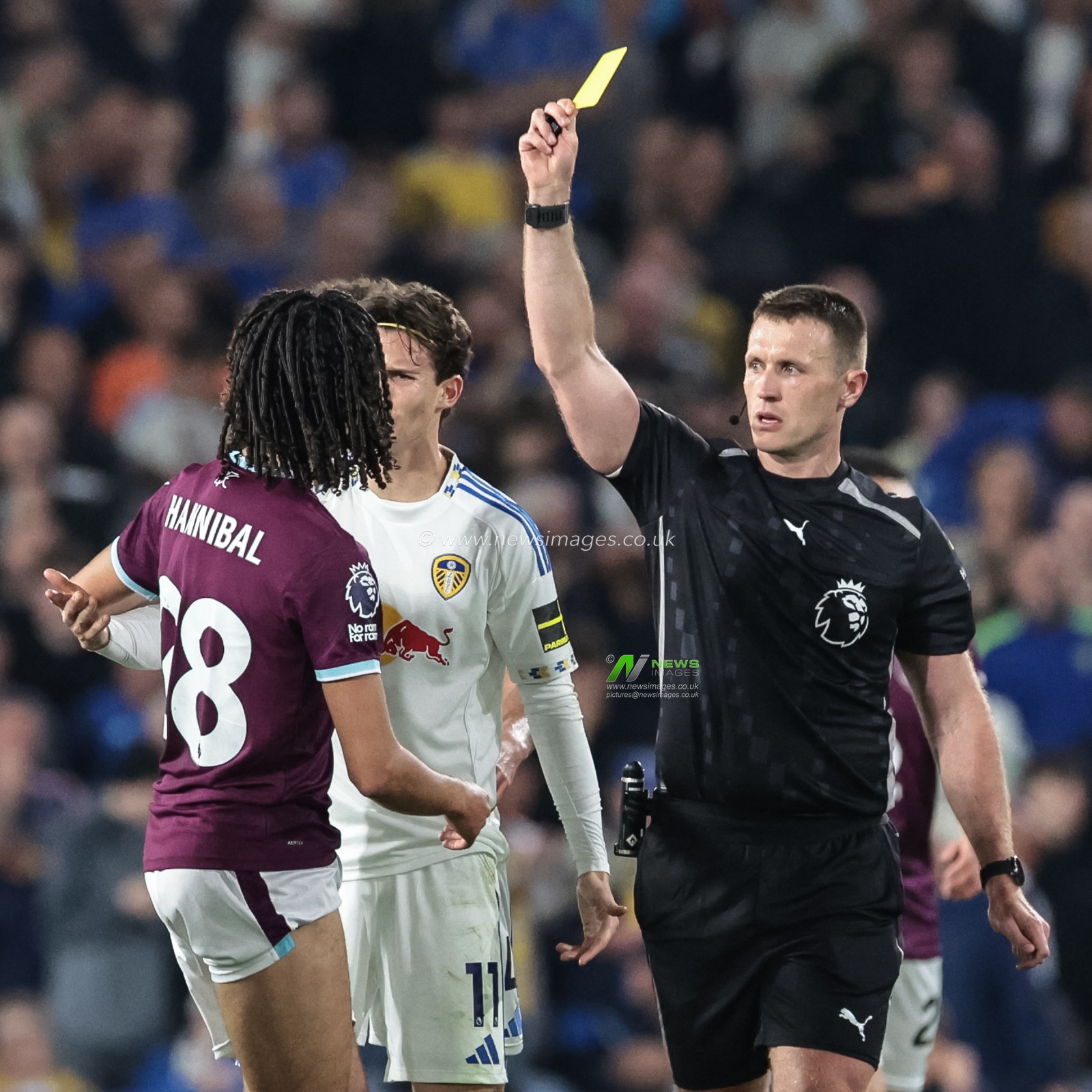 Referee Thomas Bramall gives a yellow card to Hannibal Mejbri of Burnley during the Premier League match Leeds United vs Burnley at Elland Road, Leeds, United Kingdom on 01 May 2026

(Photo by Mark Cosgrove/News Images)