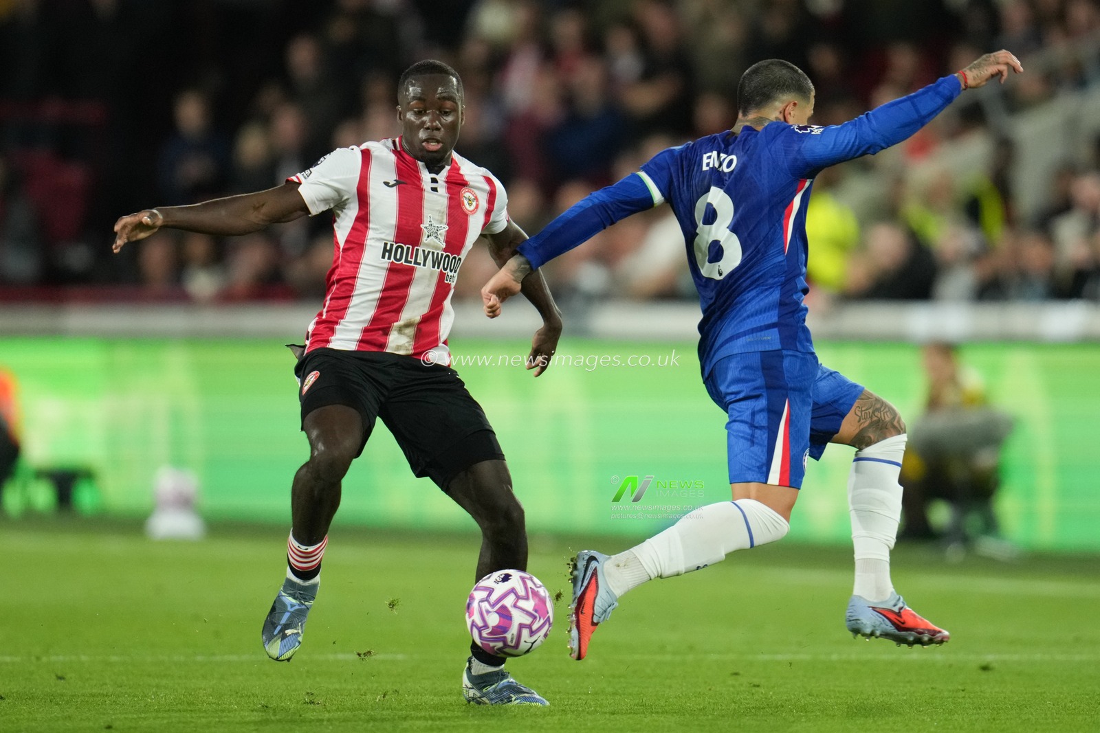 Michael Kayode of Brentford plays the ball past Enzo FernÃ¡ndez of Chelsea during the Premier League match Brentford vs Chelsea at The Gtech Community Stadium, London, United Kingdom, 13th September 2025

(Photo by Harvey Murphy/News Images)