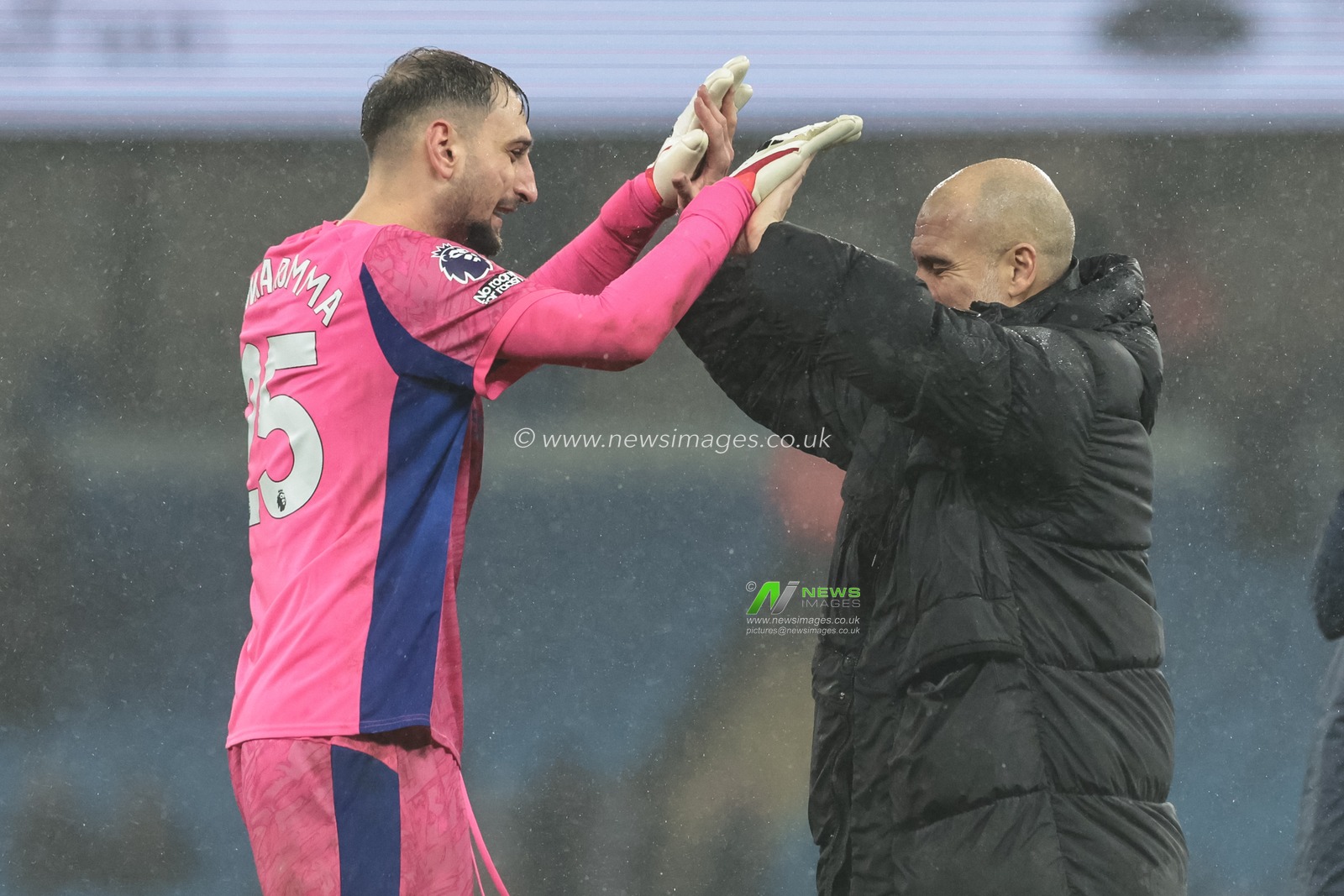Manchester City goalkeeper Gianluigi Donnarumma high fives Pep Guardiola manager of Manchester City during the Premier League match Manchester City vs Fulham at Etihad Stadium, Manchester, United Kingdom on 11 February 2026

(Photo by Mark Cosgrove/News Images)